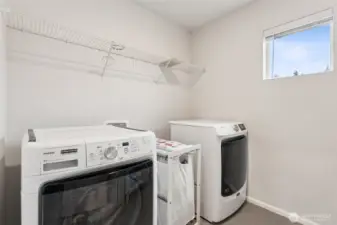 Spacious laundry room. Front load washer and dryer are included.