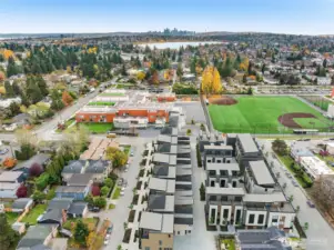 Photo rendering of finished project. Look at that view! Not only are you close to everything, but you can even catch glimpses of downtown Seattle and beyond on a clear day. Your new home awaits!
