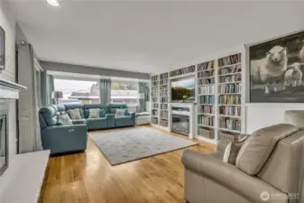 Electric fireplace stays with the home in Formal living room upstairs