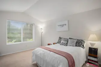 Primary Bedroom with vaulted ceiling