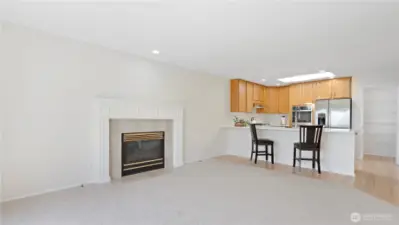 The kitchen integrates with the family room area