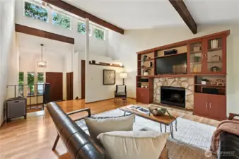 The beautiful built-in shelves surrounding the wood-burning fireplace anchor the space with beauty and grace.