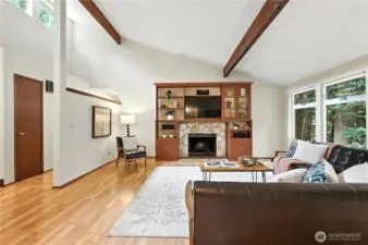 Half-wall separates the living space from the hallway without cutting it off.