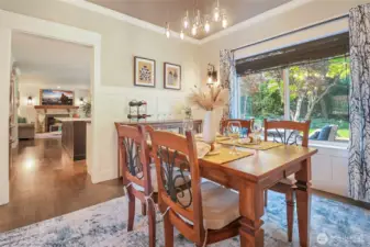 The dining room is conveniently adjacent to the kitchen.