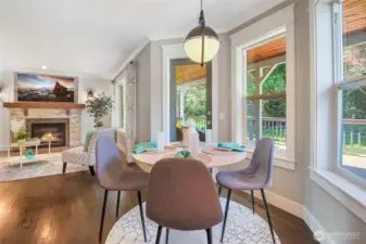 The nook space offers bay-style windows that view to the rear yard and deck. Privacy abounds.