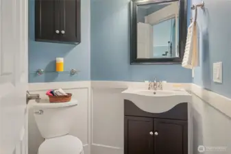 The powder room on the main floor features a beadboard accent.