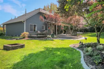 A fire pit is located in the rear yard. Enjoy evenings sitting by the cozy fire and making smores.