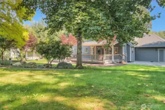 The yard offers a variety of areas for entertaining.