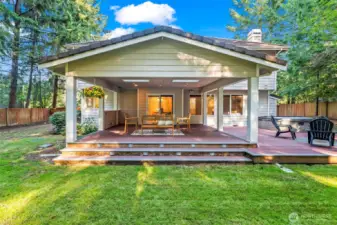 Expansive covered deck for year-round enjoyment.