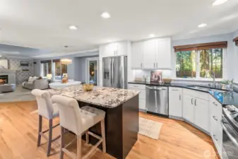 Kitchen flows naturally into the family room.