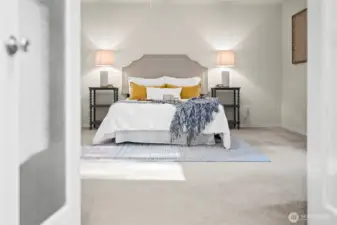 Cozy Primary bedroom upstairs with views over the backyard