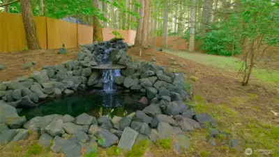 Enjoy the calming flow of this natural-style waterfall right in your own yard