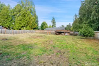 Large fenced backyard.