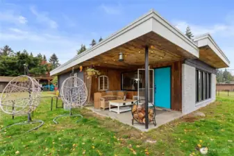 Back patio to relax with a cup of coffee and BBQ's.