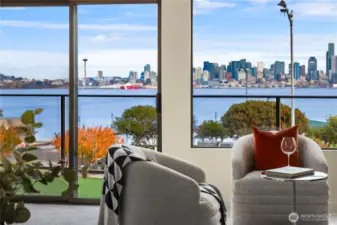 Just off the living room and dining room is a full width deck with a storage room.