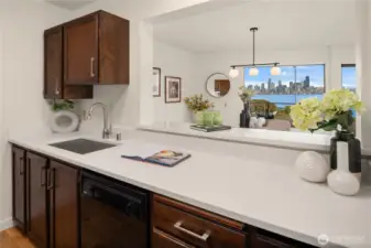 The high bar is the perfect serving window or breakfast bar.