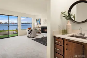 Just off the kitchen is this bonus sink and cabinetry. A painted louver door is stored in the laundry room if desired.