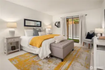 This shot of the primary bedroom shows that this room easily handles a king sized bed and the largest of bedroom furniture.