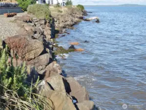 The Owner paid a lot of money to have the rock bulkhead shored-up and made stronger.