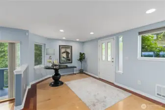 Oversized foyer (space for a piano?), coat closet and main floor powder room.