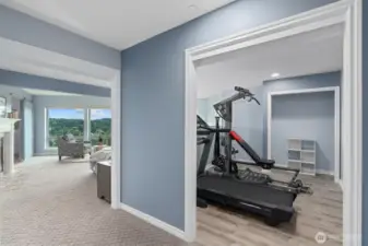 This "office/gym" can be converted into 3rd bedroom upstairs.