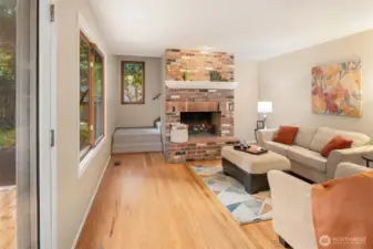 Your kitchen boast new Quartz counters, stainless appliances, tons of storage, seating, and a tranquil forested outlook.