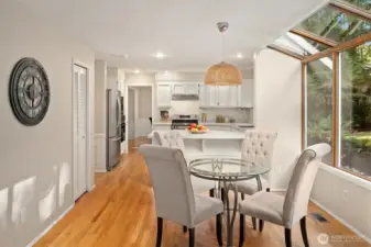 Your kitchen boast new Quartz counters, stainless appliances, tons of storage, seating, and a tranquil forested outlook.