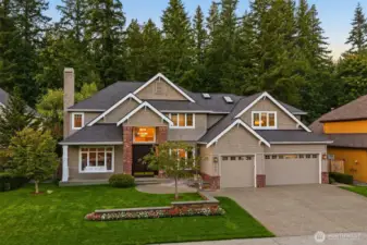 Backdrop of Natural Beauty    Impressive Murray Franklyn home on an oversized lot bordered by an expansive backdrop of forest and natural beauty in the Preswick community of Trossachs. Thoughtfully designed where form and function unite, this light-infused residence showcases soaring ceilings, solid hardwood floors, stainless steel appliances, and timeless quality throughout. Meticulously maintained, it offers an ideal balance of elegance and everyday livability.