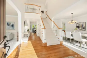 Grand Living & Flexible Spaces    Soaring ceilings and wide-open formal living and dining spaces create a striking first impression upon entry, while dual staircases enhance the home’s thoughtful architectural design. A rare main-floor ¾ bath and versatile flex room provide exceptional flexibility for a billiards room, guest suite, executive office, playroom, or multi-generational living.