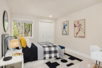 Three additional bedrooms and a full bath are thoughtfully positioned on the upper level. Bedroom #1