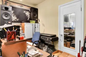 Wow! This recording studio has five layers of soundproofing! (Gas furnace and gas hot water tank are behind the mirrored door.) This is an ideal home for a serious musician.