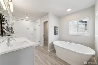 How could you not love this bath and oversized shower in the primary?