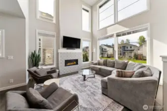 Stunning great room with gas fireplace and tons of natural light.