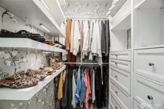 Custom walk-in closet        Built in dresser with jewelry drawer        Wall paper / Shelving