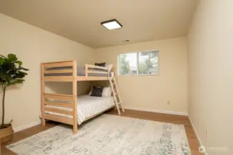 Downstairs bedroom is virtually staged