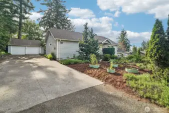 Front of home with ample parking for boat or RV
