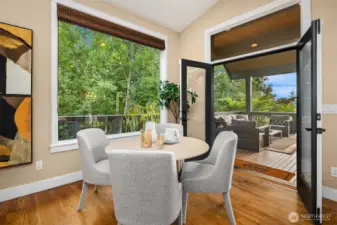 Breakfast nook opens up to covered back patio perfect for entertaining.