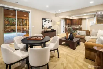 Lower level Bonus room with easy access to outdoor patio, hot tub and firepit area.