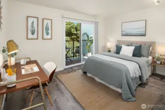 The second bedroom with access to the balcony.