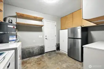 Utility and laundry space on lower level.