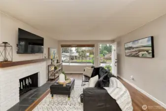 This home faces East, enter into the main living area.