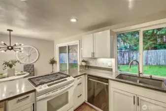 The sliding glass door gives you access to the back yard and spacious side yard.