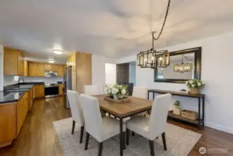 Open dining area. The photo is virtually staged.