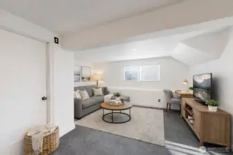 Family room filled with natural light. The photo is virtually staged.
