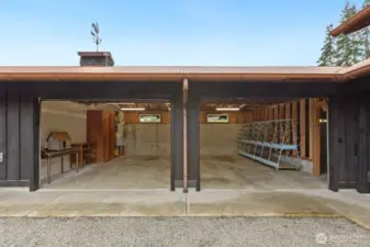 The left side of the garage (water side) is finished space, the center is garage space for 2 cars, and the right side is shop storage and has an isolated welding bay.