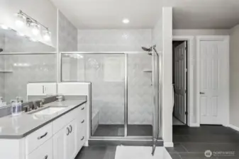 Custom tile surround on bath and shower