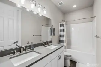 Full guest bath with double sinks