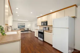 This open kitchen has plenty of cabinet space.