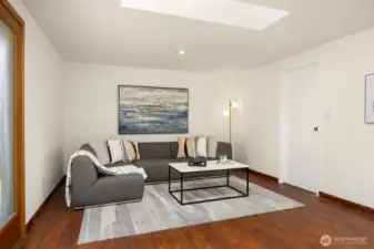 Skylight in the adjoining Living Room brighten the home.