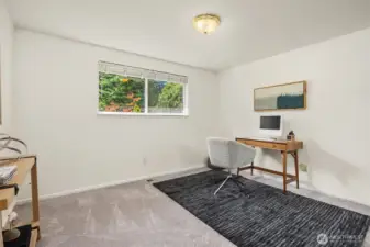 Third bedroom currently staged as an office.